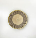 21 inch natural beige wall basket with textured brown pattern around the rim. African wall basket, Binga basket