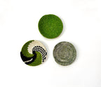Set of 3 vibrant green wall baskets, handwoven with sisal in spiral pattern. 10 inch diameter each